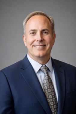Portrait of Gregory M. Erickson